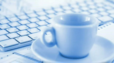 Keyboard, cup, notepad, pen and architectural drawings Stock Footage 668775