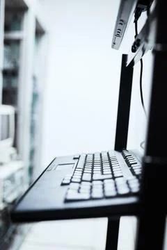 Keyboard, empty server room or IT computer for networking, cybersecurity or Foto stock