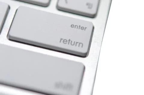 Keyboard enter key Stock Photos