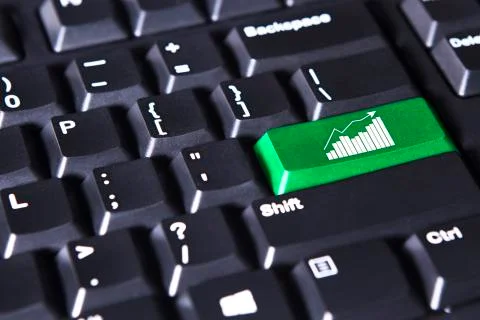 Keyboard with Finance graph Stock Photos
