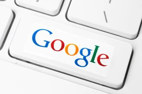 Keyboard with Google logotype, printed on paper and placed on button. Foto stock