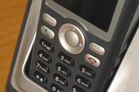 Keyboard of a gray push-button telephone close-up Stock Photos