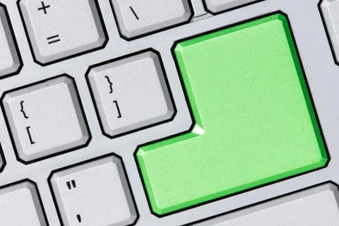 Keyboard with green enter key Stock Photos