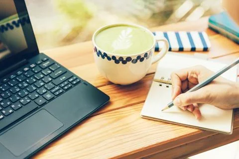 Keyboard hand note book Stock Photos