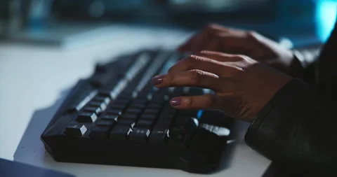 Keyboard, hands and coder in office at night working on programming for malware Stock Footage 309821999