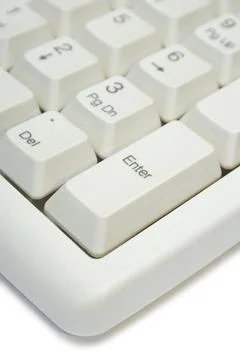 Keyboard - key Enter, close-up Keyboard - key Enter, close-up, isolated on... Stock Photos