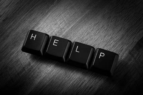 Keyboard keys help Stock Photos