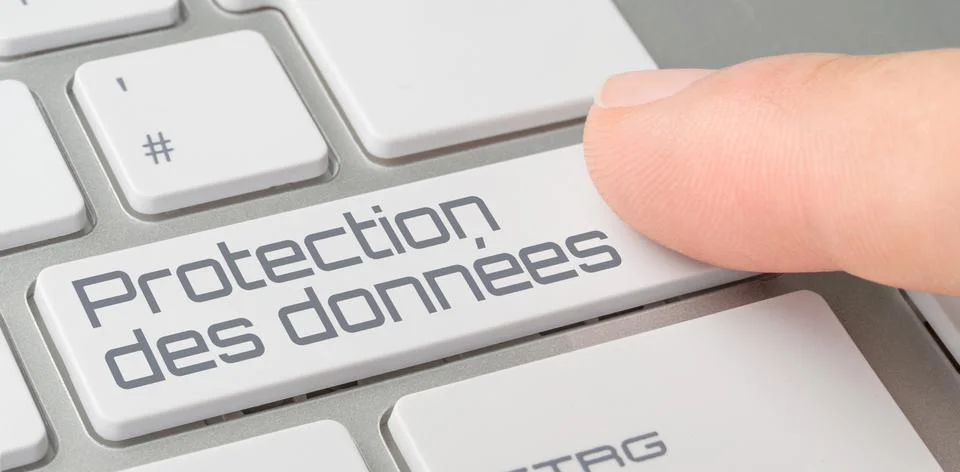 A keyboard with a labeled button - Data security in french - Protection des d Photos