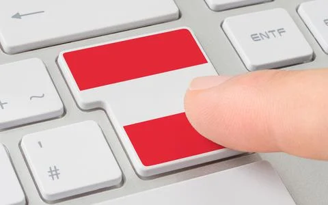A keyboard with a labeled button - Flag of Austria Stock Photos