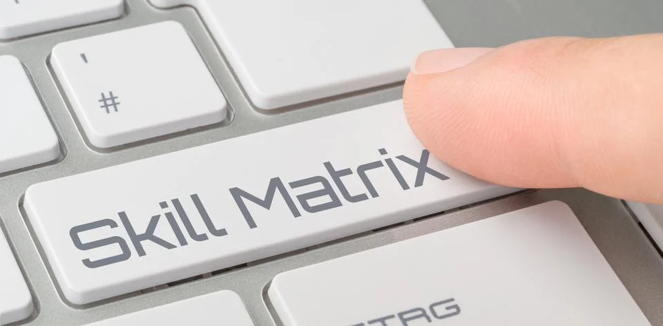 A keyboard with a labeled button - Skill Matrix 스톡 사진