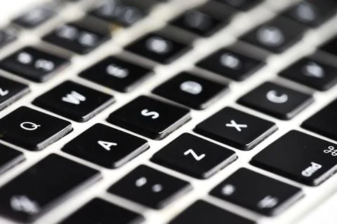 Keyboard of a notebook computer. White and black. Macro Stock Photos