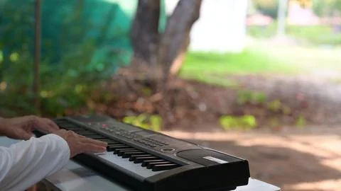 Keyboard Performance Hand Of Player In Outdoor Light, Practicing Key With S.. Stock Photos