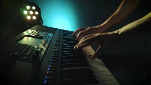 Keyboard player with lights effect Stock Footage 146134734