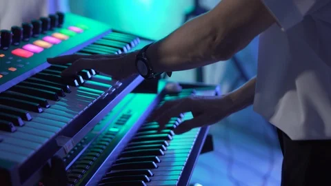 Keyboard player playing synthesizer close-up Video stock 99597766