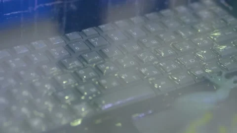 Keyboard of rugged laptop computer during water resistance test - close up Stock Footage 150552968