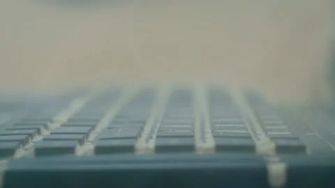 Keyboard of rugged laptop computer during dust resistance test - close up Stock Footage 158172187