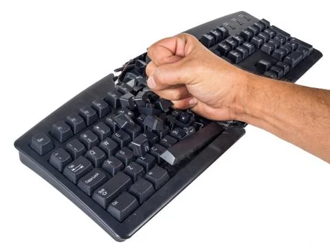 Keyboard smashed by angry user Stock Photos