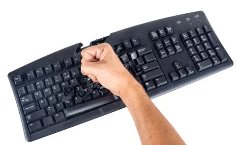 Keyboard smashed by angry user Stock Photos