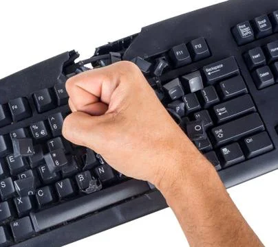 Keyboard smashed by angry user Stock Photos