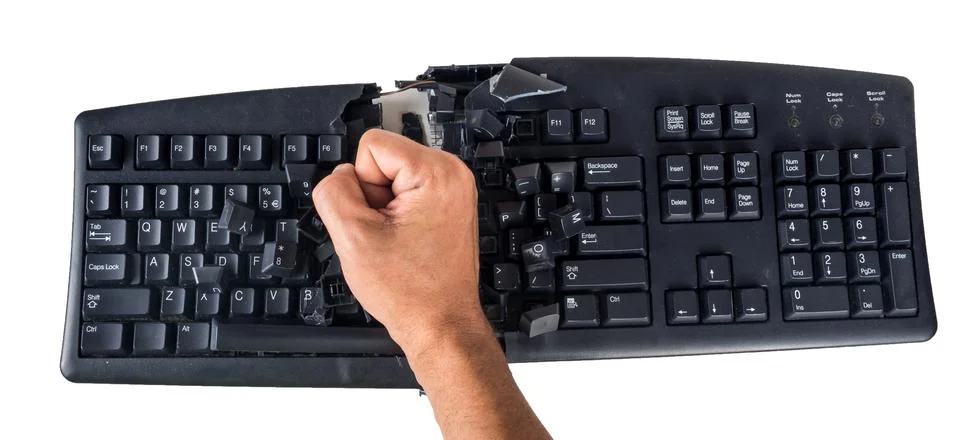 Keyboard smashed by angry user Stock Photos