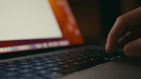 Keyboard Typing on a Laptop Computer During Remote Work in Evening Light 库存影片 331166423