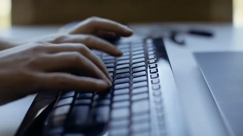 Keyboard typing on laptop for creative project Stock Footage 127394523