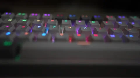 Keyboard view slow motion video footage multiple color glowing Stock Footage 290944912