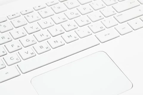 Keyboard white notebook close-up. Foto stock