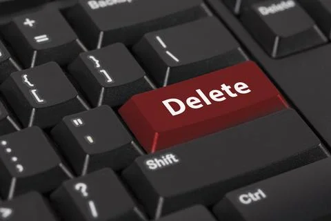 Keyboard with the word Delete on red button. Stock Photos