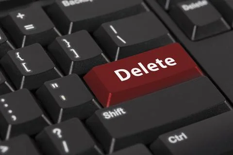Keyboard with the word Delete on red button. Stock Photos