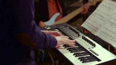 Keyboardist in Recording Studio performing Stock Footage 258067414
