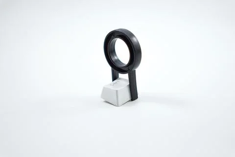 Keycap puller with mechanical keyboard keycaps isolated on a white Stock Photos