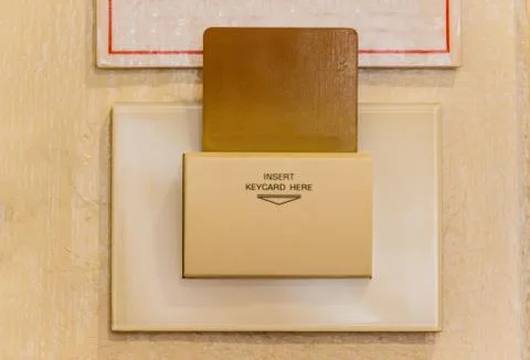 Keycard insert to power switch for control of the electric in the room Stock Photos