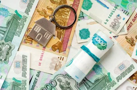 Keychain on the background of russian ruble banknotes Stock Photos