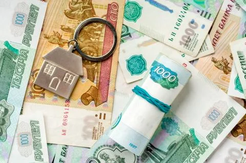 Keychain on the background of russian ruble banknotes Stock Photos