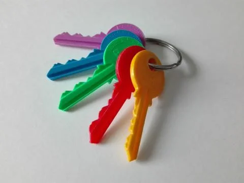 Keychain with five differently colored keys 스톡 사진