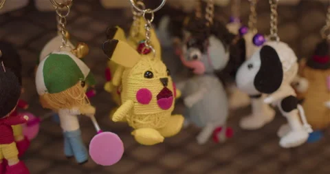 Keychains souvenirs in a store Thailand Stock Footage 234867309