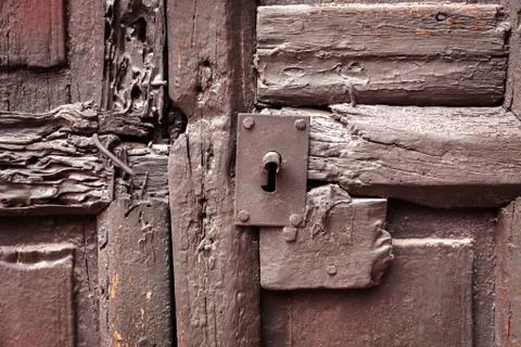 Keyhole on an old door Stock Photos