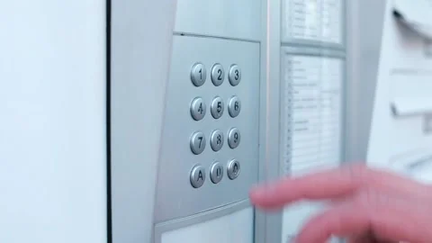 Keyless door locks. Fingers press 10-digit code must be blocked from sight. Stock Footage 136749731