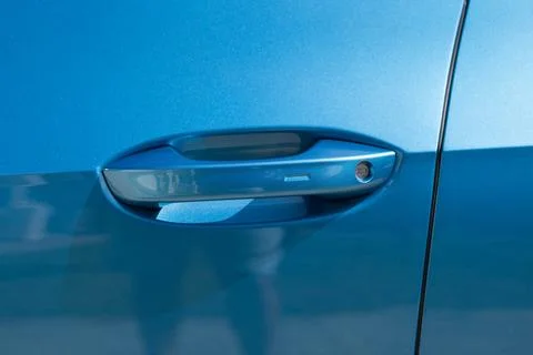 Keyless entry car door handle with keyless go touch sensor. Automatic opening of Photos