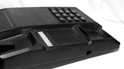 The keypad and the normal phone moving on white Stock Footage 111887693