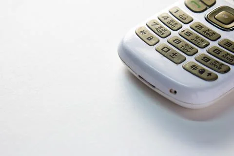 Keypad of a basic cellular phone. View of a old mobile phone with dial button Stock Photos