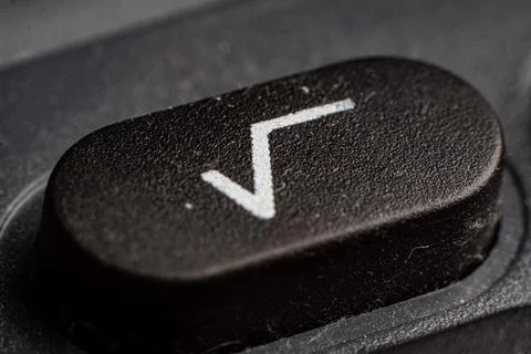 Keypad button showing square root symbol on modern electronic calculator for Stock Photos