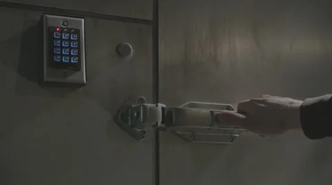 Keypad door hand opens and closes Stock Footage 52422061