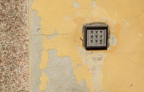 Keypad . numeric keyboard on the wall . Stock Photos