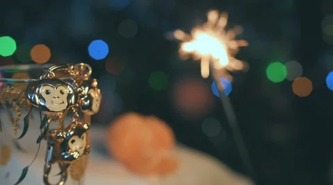 Keyring In The Form Monkey Under Mandarin And Bengal Fire Stock Footage 67500116