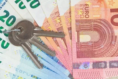 Keys and banknotes Stock Photos