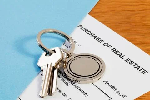 Keys and contract Stock Photos