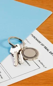Keys and contract Stock Photos