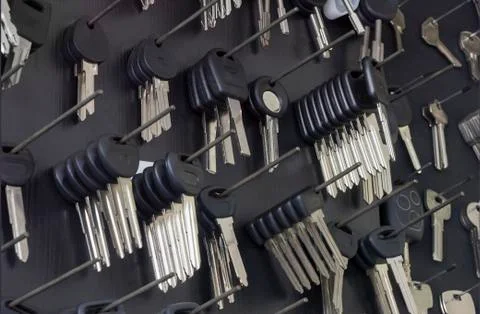 Keys for cutting on a  wall Stock Photos